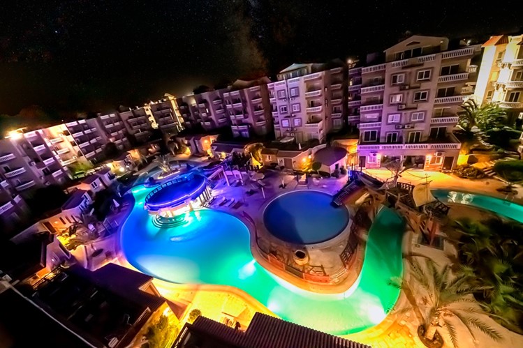 chalet in front of the pool